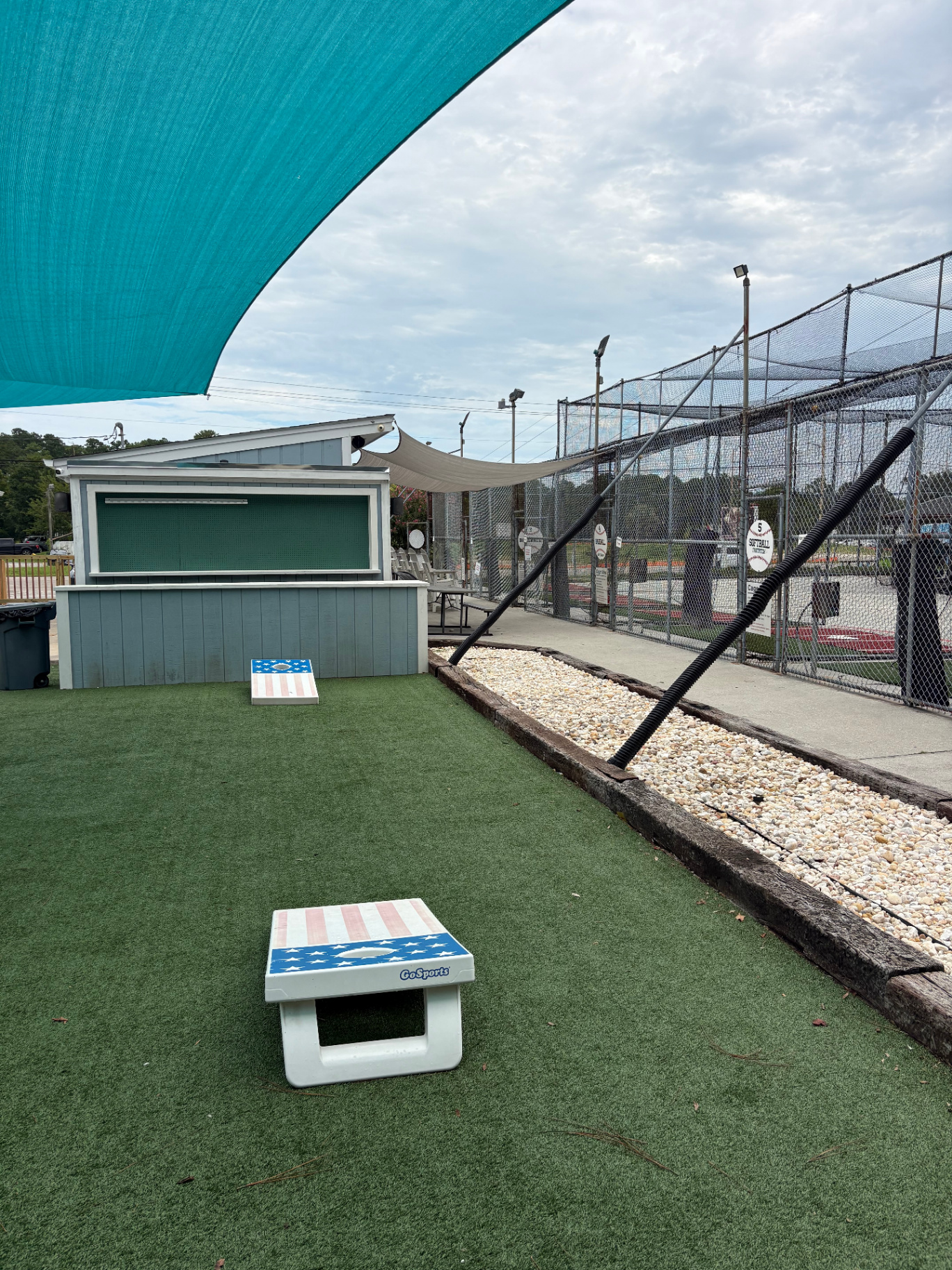 Cornhole boards on the turf