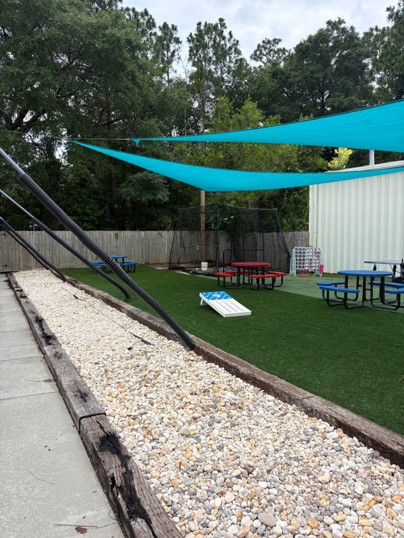 Back lawn with games and shaded seating